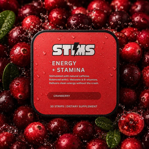 STIMS Energy + Stamina tin on a bed of cranberries